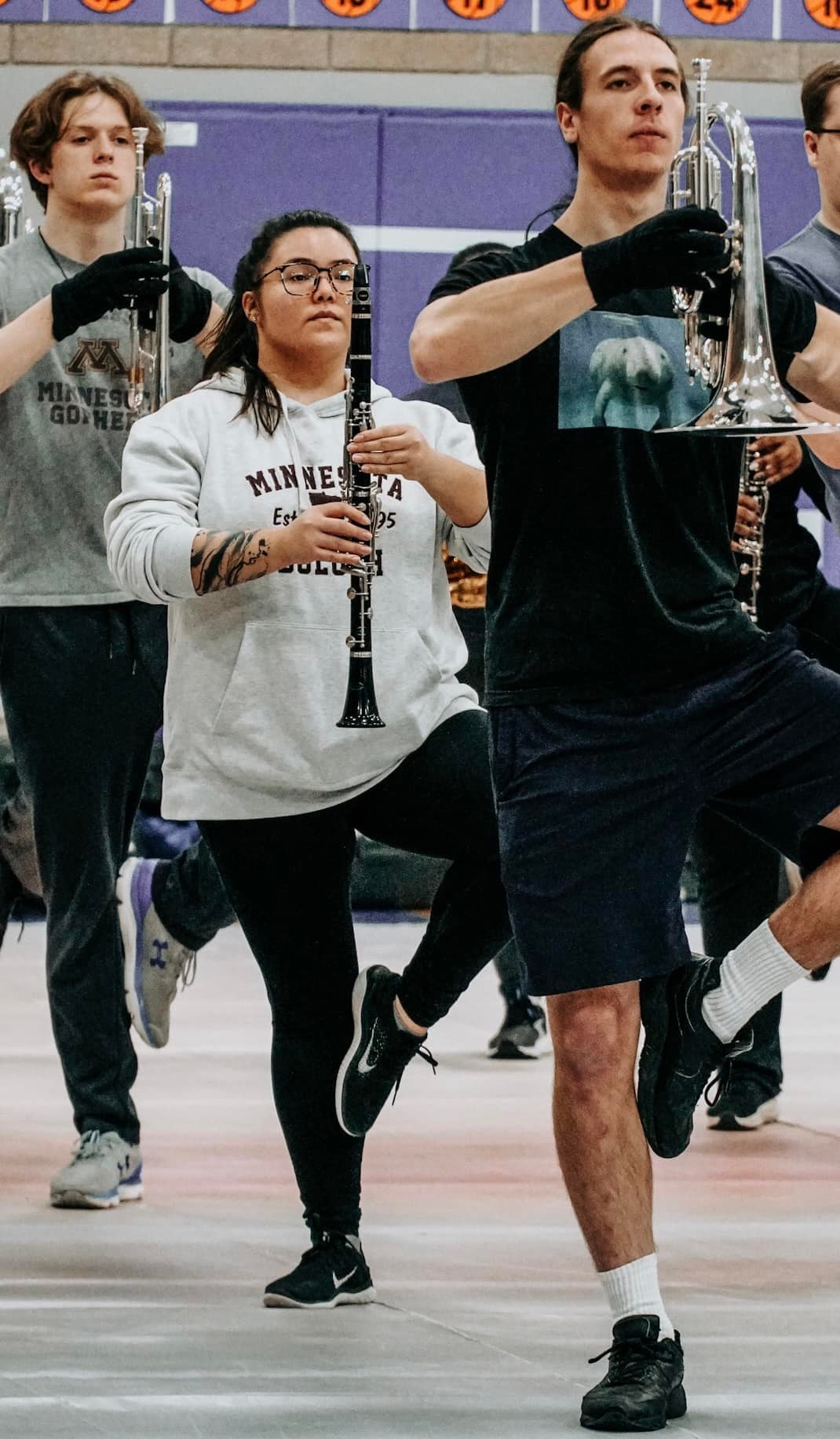 MBI Winds members marching in rehearsal