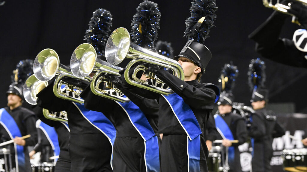 MBI Drum Corps on the field in 2025 featuring four baritone players.