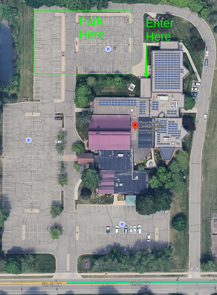 Christ-the-King-Lutheran-Church-Google-Maps - MBI Arts Aerial view of Christ the King Lutheran Church campus with a large parking lot to the left and an entrance path on the right; green labels read'Park Here' and 'Enter Here'.